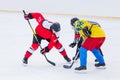 Male hockey player playing game on the rink Royalty Free Stock Photo