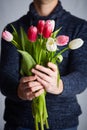 A Man holding bunch of tulips Royalty Free Stock Photo