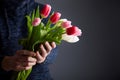 A Man holding bunch of tulips Royalty Free Stock Photo