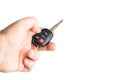 A male holding a car key isolated on a white background Royalty Free Stock Photo