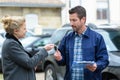 Male holding car keys with car Royalty Free Stock Photo