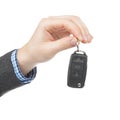 Male holding car keys with remote control system Royalty Free Stock Photo