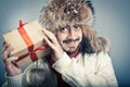 Male holding a gift Royalty Free Stock Photo