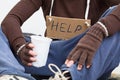 Male homeless with sign