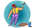 A male house painter paints a wall Royalty Free Stock Photo