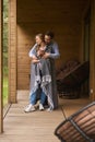 Male hugging his girlfriend while she drinking tea Royalty Free Stock Photo