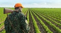 Male hunter looking at field during hunt season.