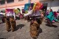 Male indigenous dancers in chaps in Ecuador