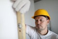 Male inspector in protective gloves hold building Royalty Free Stock Photo