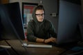 Male internet hacker in hood and glasses Royalty Free Stock Photo