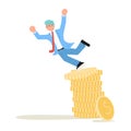Male investor falls from a stack of coins. Finance decrease and business crisis