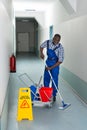 Male Janitor Cleaning Floor Royalty Free Stock Photo