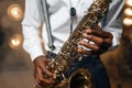 Male jazz performer plays the saxophone on stage Royalty Free Stock Photo