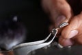 Male jeweler examining diamond ring in workshop Royalty Free Stock Photo