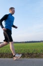 Male Jogger with motion blur Royalty Free Stock Photo