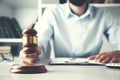 Male judge in a courtroom striking the gavel Royalty Free Stock Photo