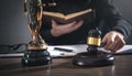 Male judge in a courtroom striking the gavel Royalty Free Stock Photo