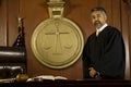 Male Judge Standing In Court Room Royalty Free Stock Photo