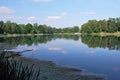 Male Kalisovo jezero lake with blue sky and clouds near Bohumin Royalty Free Stock Photo