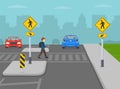 Male kid crossing the street on crosswalk. Crosswalk sign with diagonal arrow. Medians and pedestrian refuge islands. Royalty Free Stock Photo