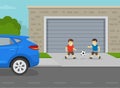 Male kids playing with ball in the driveway. Children plays game in front of garage.
