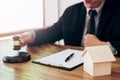 Male lawyer or judge hand`s striking the gavel on sounding block Royalty Free Stock Photo