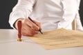 Male lawyer working with contract papers.