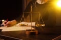 Male lawyer working with contract papers and wooden gavel on tabel in courtroom. justice and law ,attorney, court judge Royalty Free Stock Photo