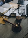 Male lawyer working with contract papers and wooden gavel on tabel in courtroom. justice and law ,attorney, court judge, concept
