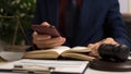 Male lawyer working with law book, A legal binding, Unilateral contract, Multilateral, Non-reciprocal contract, Default, Royalty Free Stock Photo