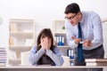 The male lecturer giving lecture to female student Royalty Free Stock Photo