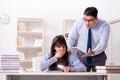 The male lecturer giving lecture to female student Royalty Free Stock Photo