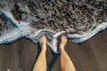 Selfie of man bare feet on sand beach and wave, summer concept. Royalty Free Stock Photo