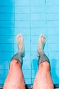 Male Legs in Pool