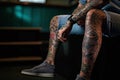 Male legs with tattoos close up. Generative AI Royalty Free Stock Photo