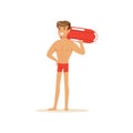 Male lifeguard in red shorts standing with life preserver buoy, professional rescuer on the beach vector Illustration Royalty Free Stock Photo