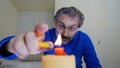 Male lighting a birthday candle