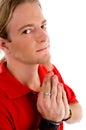 Male looking at camera while praying Royalty Free Stock Photo