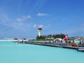 MALE, MALDIVES - JULY 14, 2017: Tourists preparing to get on a seaplane at Male seaplane terminal.