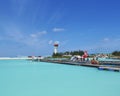 MALE, MALDIVES - JULY 14, 2017: Tourists preparing to get on a seaplane at Male seaplane terminal.