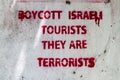 MALE, MALDIVES - JULY 11, 2016: Writing Boycott Israeli tourists, they are terrorists on a wall in Male, Maldive Royalty Free Stock Photo