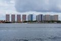 Male, Maldives - November 25, 2019: Industrial and construction equipment and new high rise apartment buildings in the capital