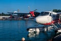 Male, Maldives, 20.11.2020. Trans Maldivian Airways seaplane Twin Otter Series 400 docked at seaplane terminal Royalty Free Stock Photo