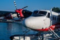 Male, Maldives, 20.11.2020. Trans Maldivian Airways seaplane Twin Otter Series 400 docked at seaplane terminal