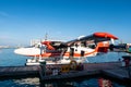 Male, Maldives, 20.11.2020. Trans Maldivian Airways seaplane Twin Otter Series 400 docked at seaplane terminal