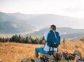 Male man traveler on the background of the Caucasian mountains Royalty Free Stock Photo