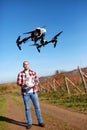 Male manage drone from ground Royalty Free Stock Photo