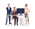 Male managers working on computer at office, making corrections in project, angry female worker or boss standing beside Royalty Free Stock Photo