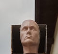 Male mannequin head in a box. Royalty Free Stock Photo