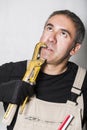 Worker specialist plumber, engineer or constructor with wrench Royalty Free Stock Photo